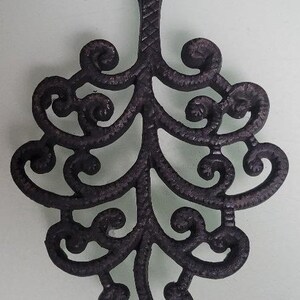 Vintage cast iron Trivet