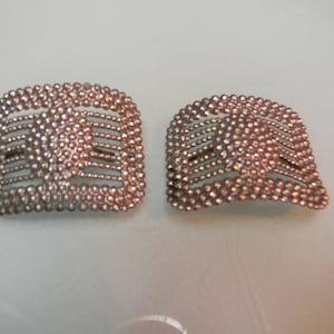 Antique metal shoe clips