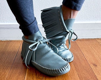 handmade moccasins, indigenous maker, fringe moccasins, stonewash, barefoot shoes, leather shoes, slippers, bridal shoes