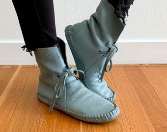 handmade moccasins, indigenous maker, moccasin boots, stonewash, barefoot shoes, leather slippers, bridal shoes, leather booties