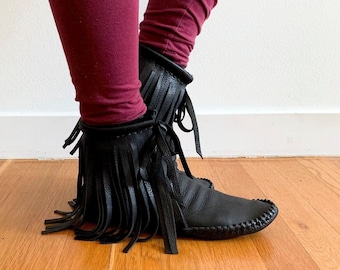 handmade leather moccasins | indigenous maker | fringe moccasin boots | fringe boots | black | barefoot shoes | bridal shoes