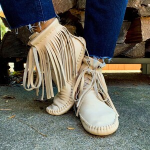 handmade moccasins | indigenous maker | fringe moccasin boots | moccasin boots | biscotti | barefoot shoes | bridal shoes image 2