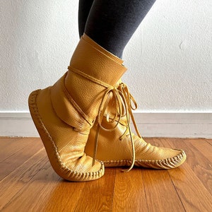 handmade moccasins | indigenous maker | moccasins | moccasin boots | wrap boots | mango | slippers | barefoot shoes | bridal shoes