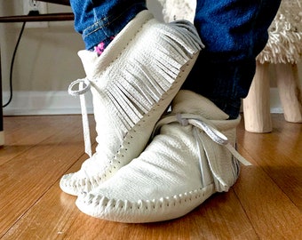 handmade moccasins, indigenous maker, fringe moccasins, white, barefoot shoes, bridal shoes
