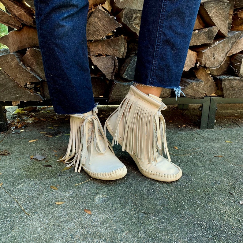 handmade moccasins | indigenous maker | fringe moccasin boots | moccasin boots | biscotti | barefoot shoes | bridal shoes image 1