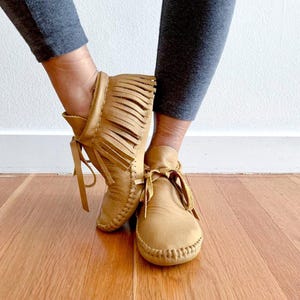 handmade moccasins | indigenous maker | handmade moccasins | fringe moccasins | ankle moccasins | butterscotch leather | barefoot shoes