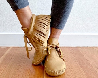 handmade moccasins | indigenous maker | fringe moccasins | butterscotch | barefoot shoes | bridal shoes | ankle booties