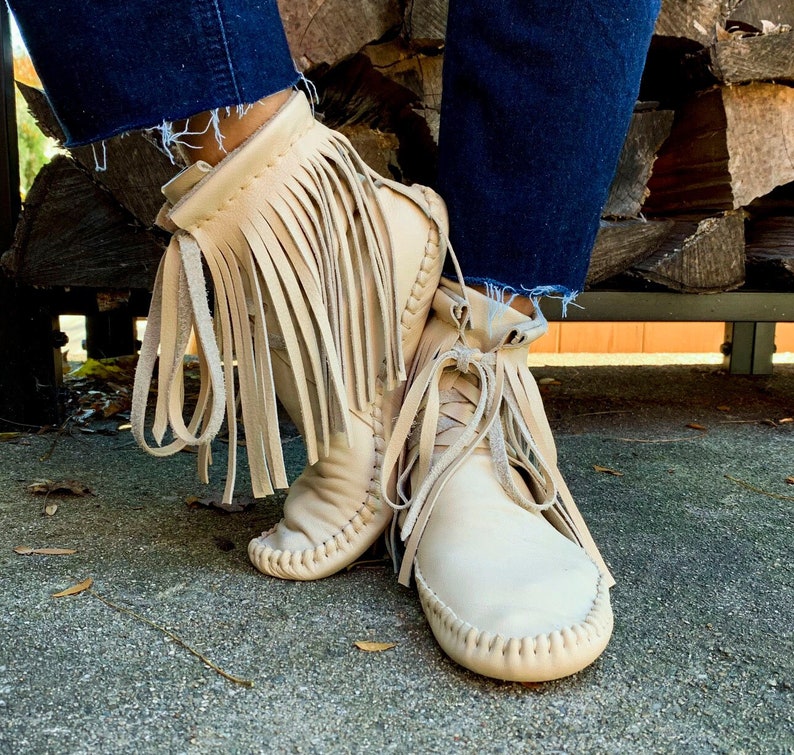 handmade moccasins | indigenous maker | fringe moccasin boots | moccasin boots | biscotti | barefoot shoes | bridal shoes image 2