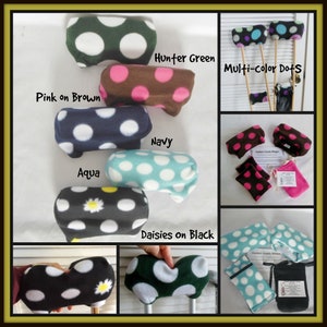 May include: Assortment of colorful fleece crutch covers with polka dot patterns.  The covers are in hunter green, brown with pink dots, navy blue, aqua, black with white daisies, and multi-colored dots.  The text "Multi-color Dots" is visible in the image.