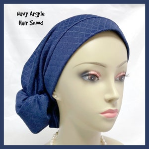 May include: A navy blue argyle hair snood. The head covering features a diamond pattern and is made of quilted fabric. The text "Navy Argyle Hair Snood" is visible. The snood is displayed on a mannequin head.