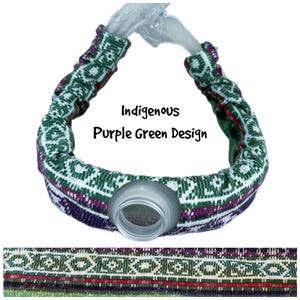 May include: A fabric-covered strap featuring a woven geometric pattern in shades of green, purple, and white, with a central plastic bottle neck attachment. The text "Indigenous Purple Green Design" is printed in the center of the image.