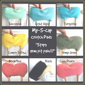 May include: Assortment of colorful fleece crutch pads in various colors, including sea green, light aqua, turquoise, lemon yellow, army green, brick red, black, and lush peach. The pads are designed to fit over the top of crutches and are labeled with their respective colors. The text "My-S-cap crutch Pads" and "Stops arm pit pain!!!" is displayed in the center of the image.