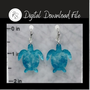 May include: A pair of blue and white turtle-shaped earrings with silver-colored hooks. The earrings are approximately 2 inches in length. The image also includes the text "Digital Download File".
