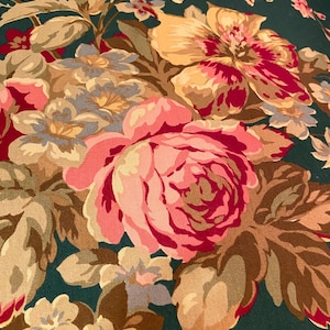 May include: Close-up of a floral pattern featuring large pink and yellow roses, smaller white and blue flowers, and brown leaves against a dark teal background. The design has a vintage, botanical aesthetic.