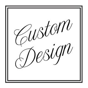 May include: A black and white image with a double border frame. The text "Custom Design" is written in a cursive font.