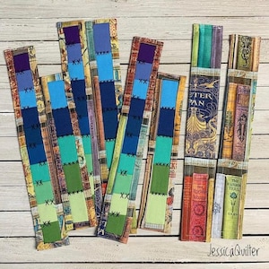 Könnte beinhalten: Ein Set aus sieben bunten Stoff-Lesezeichen mit Buchthema. Die Lesezeichen sind aus verschiedenen Stoffen gefertigt und haben eine Vielzahl von Mustern, darunter Streifen, Punkte und Blumenmuster. Die Lesezeichen sind alle unterschiedlich lang und breit. Die Lesezeichen sind perfekt, um Ihren Lieblingsbüchern eine persönliche Note zu verleihen.