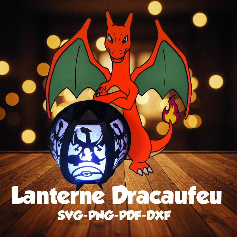May include: A red and green dragon-shaped lantern with a black and white silhouette of a dragon inside. The lantern is lit up and the dragon is casting a shadow on the wooden surface. The text "Lanterne Dracaufeau SVG-PNG-PDF-DXF" is below the lantern.