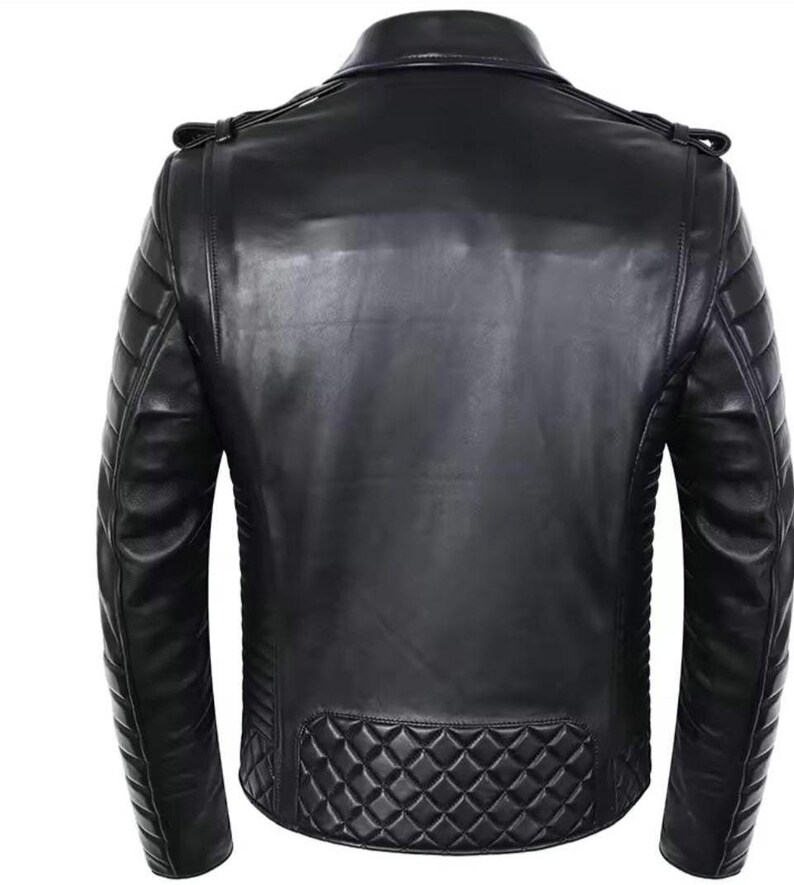 May include: Black leather jacket with quilted shoulder and lower back panel detailing. The jacket features a classic biker style with a notched collar, asymmetrical zipper, and multiple pockets. The back view showcases the jacket's tailored fit and sleek design.