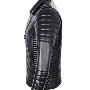 May include: Black leather jacket with a quilted design on the shoulders and lower sleeves. The jacket has a classic asymmetrical zipper closure and a notched collar. The sleeves have zippered cuffs. The jacket is a sleek, modern style.