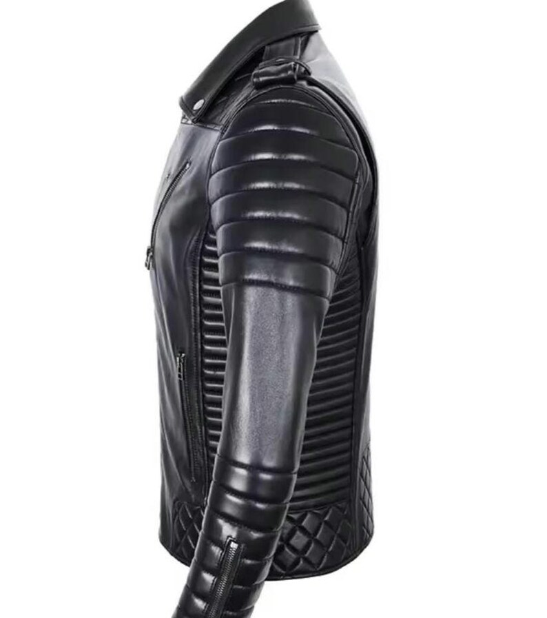 May include: Black leather jacket with a quilted design on the shoulders and lower sleeves. The jacket has a classic asymmetrical zipper closure and a notched collar. The sleeves have zippered cuffs. The jacket is a sleek, modern style.