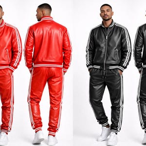 Puede incluir: Se muestran dos ch&aacute;ndales a juego, uno rojo y otro negro. Cada conjunto incluye una chaqueta con cremallera y pantalones a juego con rayas blancas en las mangas y las piernas. Los conjuntos son de material brillante y se combinan con zapatillas blancas.