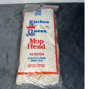 May include: A new Kitchen Queen Mop Head in a clear plastic bag. The packaging has a red and white border and features the words "Kitchen Queen" and "Mop Head" in red and blue. The text "#8 RAYON" and "QUALITY & PRIDE SINCE 1945" are also visible.