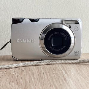 May include: A handmade wooden sign with the text "Welcome" in a playful font. The sign features a distressed white background and a dark brown border. It is designed for indoor or outdoor use.