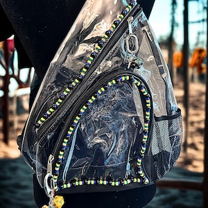Mochila transparente con tira trasera THE MARY