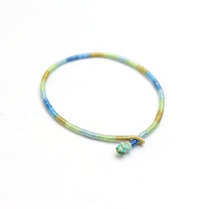 Handwoven Rainbow Energy Bracelet: Adjustable Friendship Jewelry