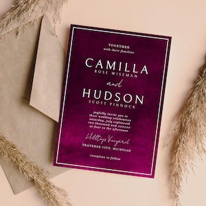 May include: A rectangular wedding invitation card with a deep burgundy watercolor background and a thin white border. The text reads: TOGETHER with their families CAMILLA ROSE WISEMAN and HUDSON SCOTT PINNOCK joyfully invite you to their wedding celebration.