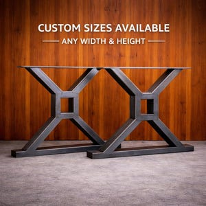 May include: Two raw steel table bases with an X-shaped design and a square centre. The bases are made of thick metal and are suitable for a custom table. The text in the image reads: CUSTOM SIZES AVAILABLE - ANY WIDTH & HEIGHT.