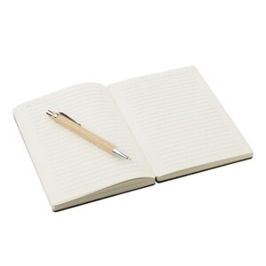 May include: An open notebook with lined pages and a light brown pen. The pen is resting on the left page of the notebook. The notebook has a black cover and the pages are off-white.