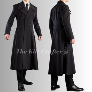 May include: A long, black coat with a double-breasted front and a tailored fit. The coat features a notched lapel, multiple buttons, and a long, flowing skirt. The text "The Kilt Crafter" is visible on the coat. The coat is paired with black pants and dress shoes.