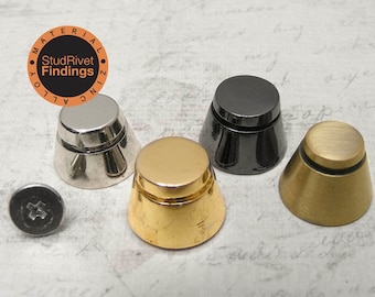 May include: Four metal cone-shaped rivets in silver, gold, black, and brass. The rivets have a flat top and a groove around the middle. The rivets are made of zinc alloy. "StudRivets Findings" is printed on a circular label.