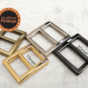 May include: Three metal buckle slides in gold, silver, and black. The buckles are 15mm, 20mm, and 20mm in size. The buckles are made of zinc alloy.