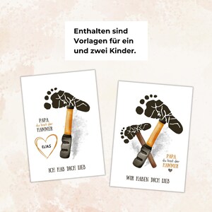 May include: Two white cards with a hammer design made from footprints. The text on the cards reads "PAPA du bist der HAMMER" and "ICH HAB DICH LIEB" and "WIR HABEN DICH LIEB". One card has a heart with the name "ELIAS".