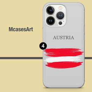 Peut inclure: Une coque de t&eacute;l&eacute;phone blanche avec un design de drapeau autrichien rouge et blanc. La coque a un dos transparent et un devant blanc avec le mot "AUSTRIA" imprim&eacute; en noir. La coque est con&ccedil;ue pour un t&eacute;l&eacute;phone avec un syst&egrave;me de triple cam&eacute;ra.
