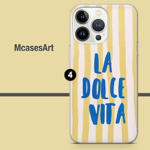 May include: A clear phone case with a yellow and white striped pattern. The text "LA DOLCE VITA" is printed in blue on the case.