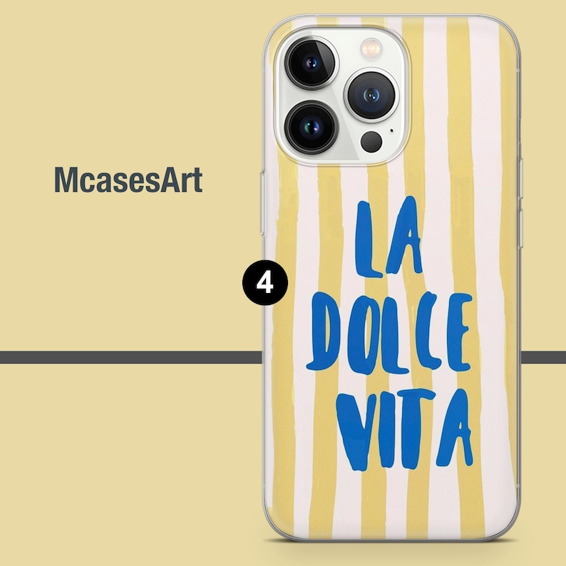 May include: A clear phone case with a yellow and white striped pattern. The text "LA DOLCE VITA" is printed in blue on the case.