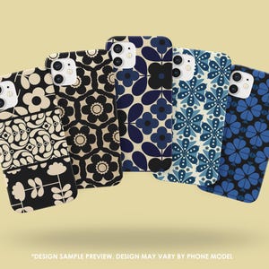 May include: Five phone cases with floral and geometric patterns in black, white, and shades of blue. The designs include large flowers, stylized blossoms, and symmetrical shapes. The cases are displayed against a light yellow background. Text at the bottom reads "DESIGN SAMPLE PREVIEW. DESIGN MAY VARY BY PHONE MODEL."