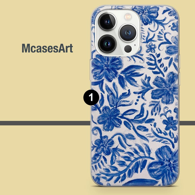 May include: A clear phone case with a blue and white floral design. The case has a raised camera bump and a cutout for the phone's buttons.