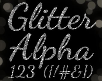May include: Silver glitter alphabet letters and numbers, including 123 and punctuation marks. The letters are in a cursive font. The background is black with a blurred out-of-focus light pattern.