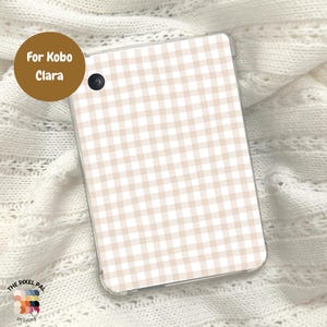 May include: A clear Kobo Clara case with a beige and white gingham pattern. The case has a camera hole and the text "For Kobo Clara" in a brown circle. The Pixel Pal Designs logo is in the bottom left corner.