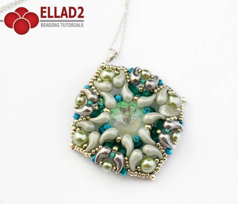 May include: A green and silver beaded pendant necklace with a hexagonal shape and a central green crystal. The pendant is made with seed beads and features a delicate, intricate design.