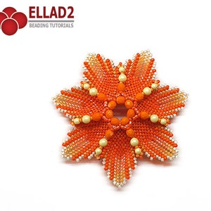 May include: Orange and cream beaded flower brooch with a starburst design. The brooch is made with small seed beads and larger round beads. The center of the flower has a smaller starburst design.