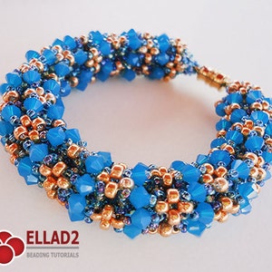 May include: A blue and copper beaded bracelet with a twisted design. The bracelet is made with small seed beads and larger faceted beads.