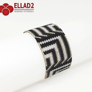 May include: A black and white beaded bracelet with a geometric pattern and gold accents. The bracelet is made with small beads and has a woven design.