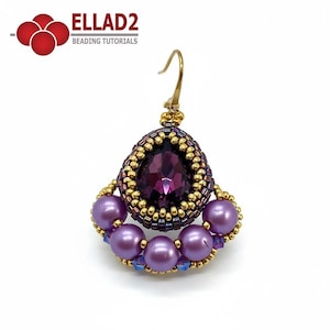 May include: A handcrafted earring featuring a large, teardrop-shaped purple crystal surrounded by gold-colored beads. Below, a fan-shaped design of purple pearls and smaller blue beads adds detail. The earring has a gold-colored hook.