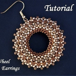 May include: A pair of gold and brown beaded earrings in the shape of a wheel. The earrings are on a dark blue background with the word "Tutorial" written in white above them and the words "Wheel Earrings" written in white below them.