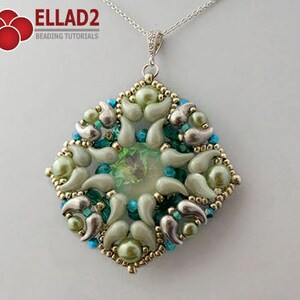 May include: A silver chain necklace with a green and silver beaded pendant. The pendant is a square shape with a geometric design. The beads are in shades of green, silver, and white.